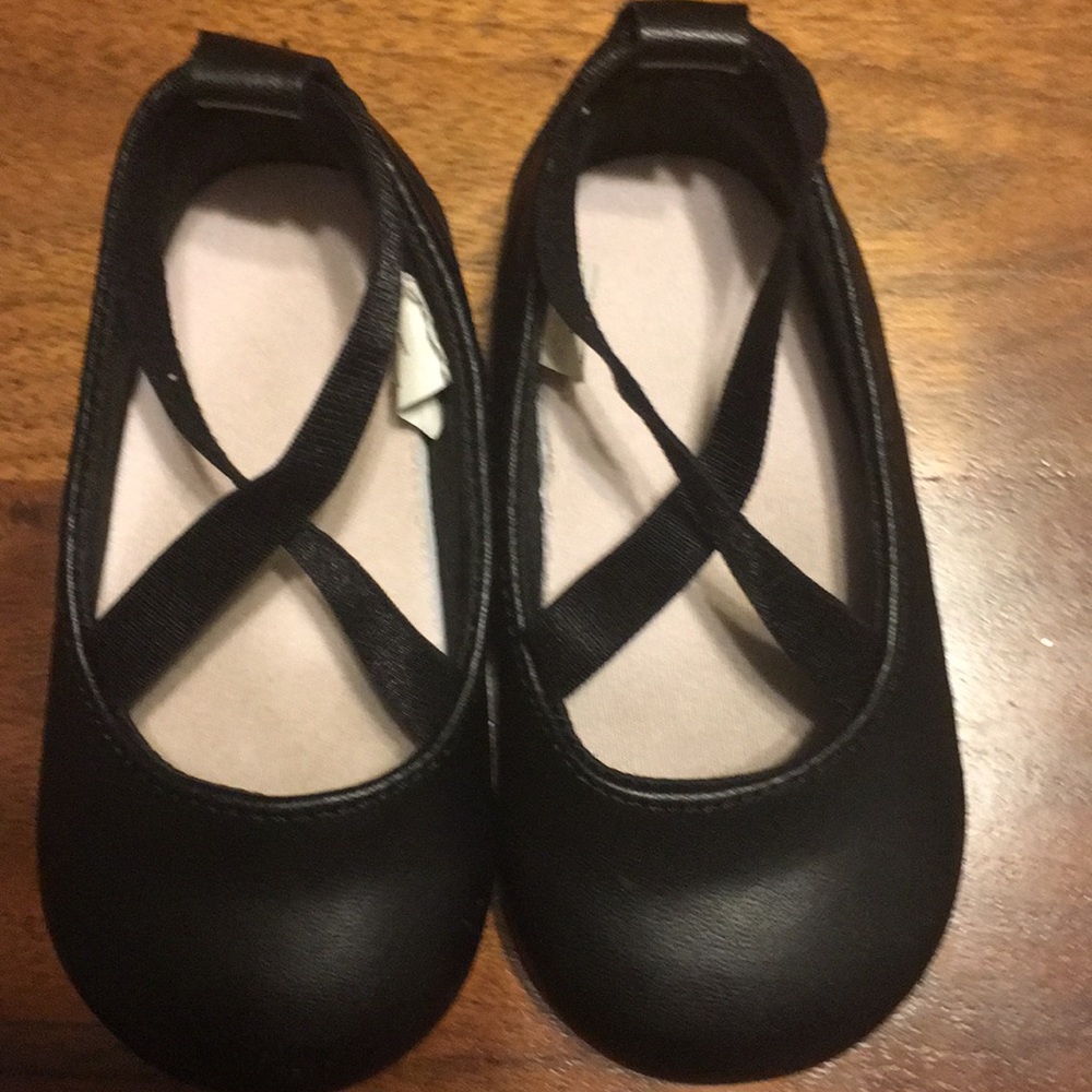 Black baby shoes size 4.